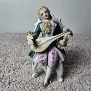 Dresden Seated Porcelain Man Playing QatarAntique Figurine
